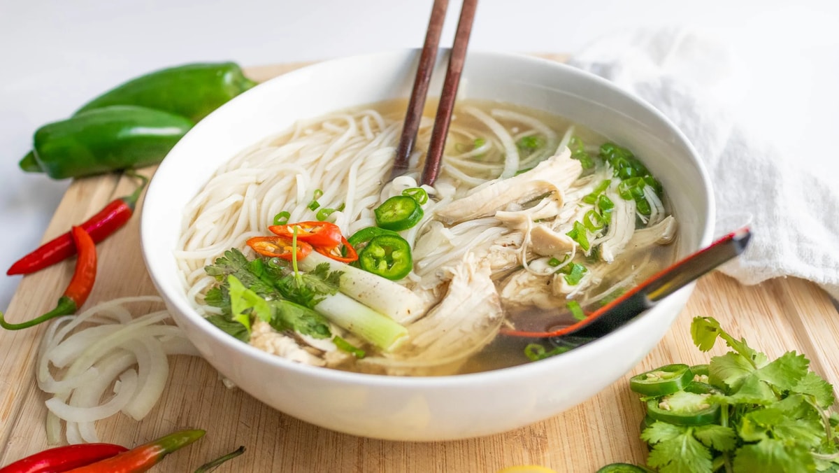 Chicken pho is a lighter alternative made with whole chicken simmered with ginger and shallots